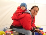 Nuna Parr's grandniece carrying her child in the
    traditional amalti