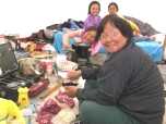 Nuna Parr's wife, Atituq with adopted daughters, Padlo and Pootoogoo and granddaughter, Ellisipee