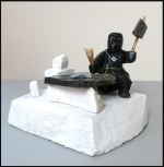 Man Carving Stone