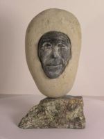 Inuit sculpture - face in stone